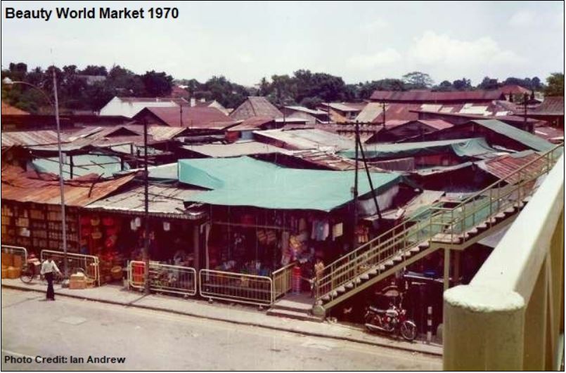 the old beauty world centre, make shift tents and wood planks and zinc plates cluttered with goods and people.